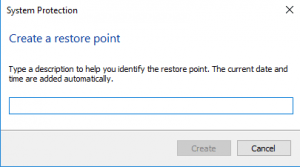 create a system restore point manually